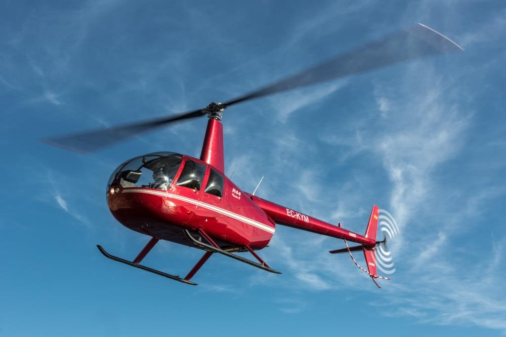 Helicopter Tours in Cala Llenya photo 1